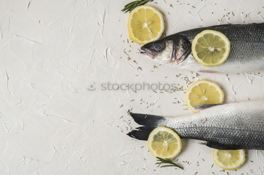 Similar – Dorado fish with ingredients for cooking