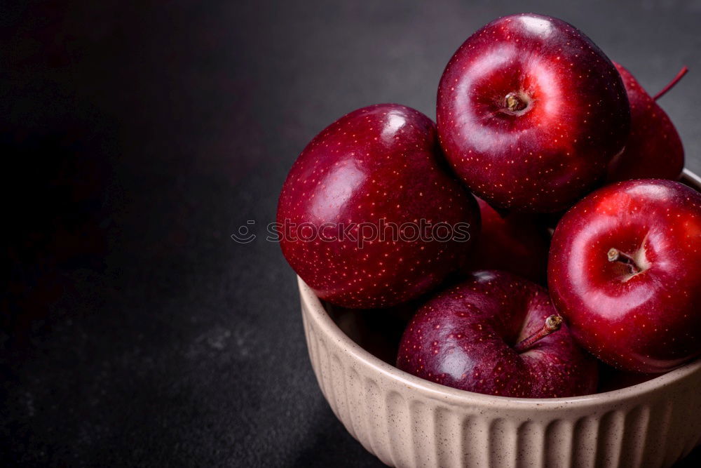 Similar – ripe red peaches in a wooden bowl on a table