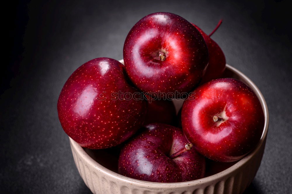 Similar – ripe red peaches in a wooden bowl on a table