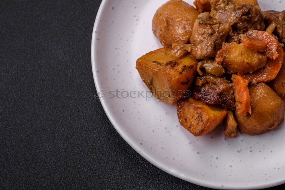 Similar – Image, Stock Photo Roasted pork fillet with crust and baked potatoes