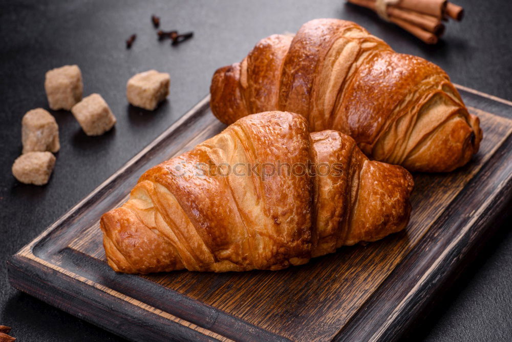 Similar – fresh bread and baked goods on wooden