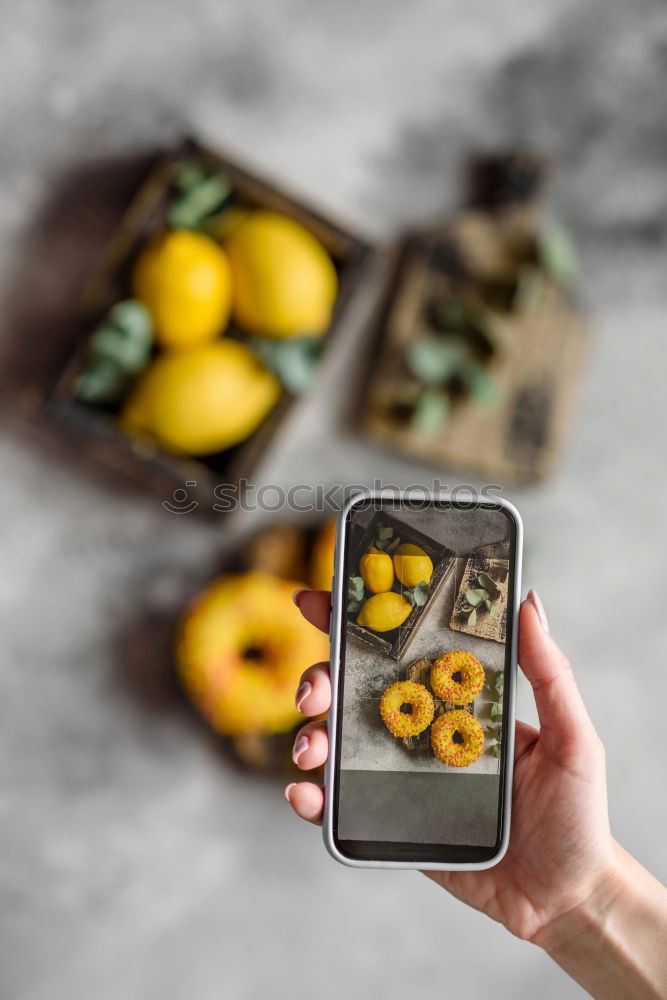 Similar – Image, Stock Photo Hands with tablet PC on kitchen table with pumpkin