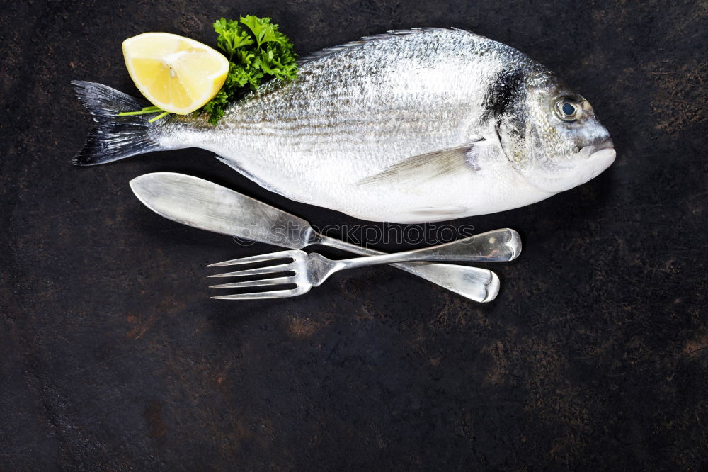 Similar – Image, Stock Photo Doardo fish with onion, lemon and spices