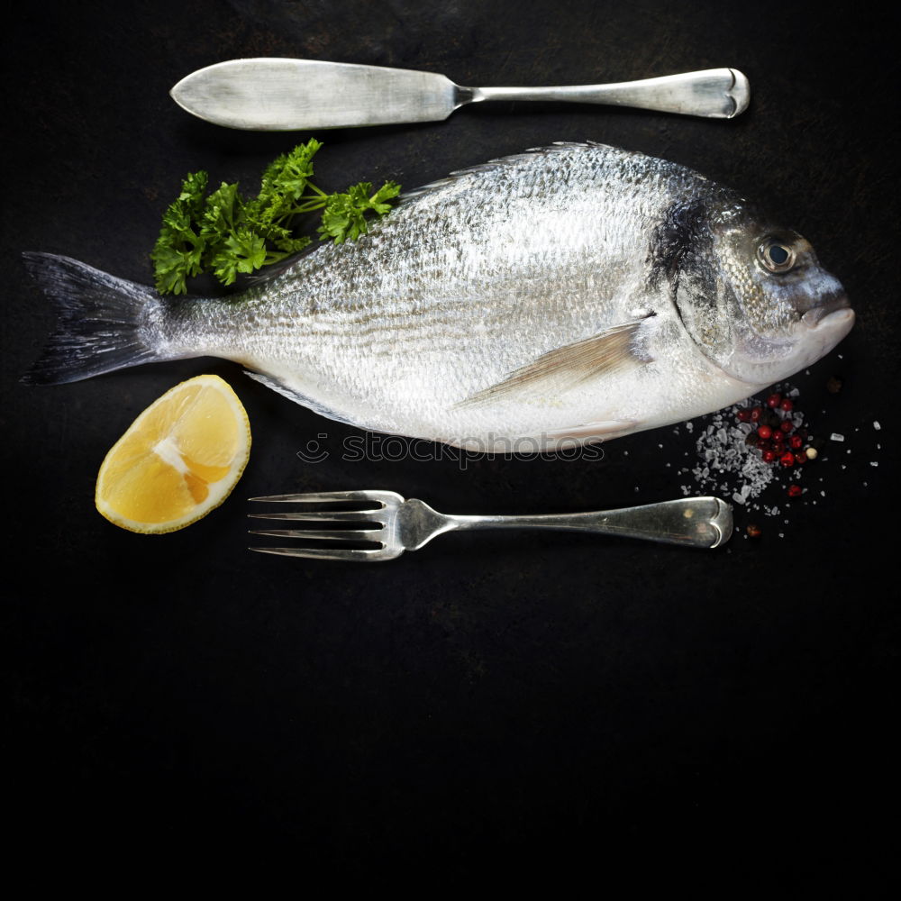 Similar – Image, Stock Photo Doardo fish with onion, lemon and spices