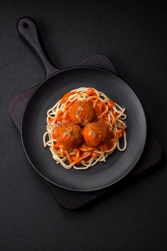 Similar – Image, Stock Photo Spaghetti with meatballs and tomato sauce