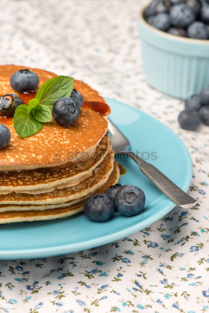 Similar – Pancakes with raspberries and blueberries