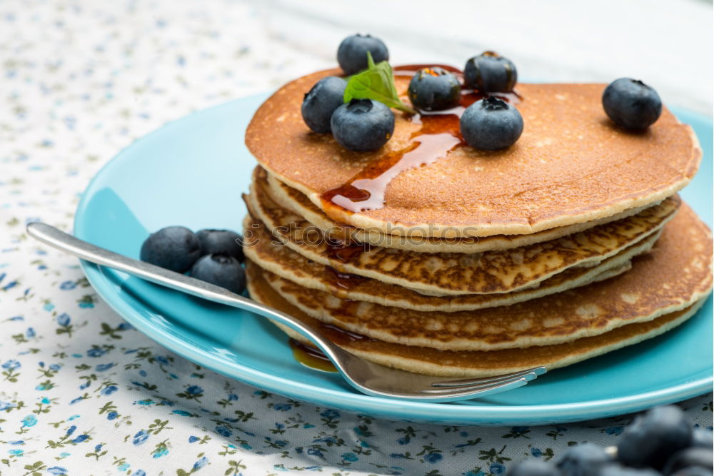 Similar – Pancakes with raspberries and blueberries