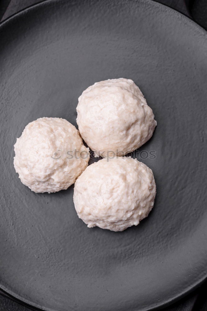 Similar – Meringue with cracks in old bowls