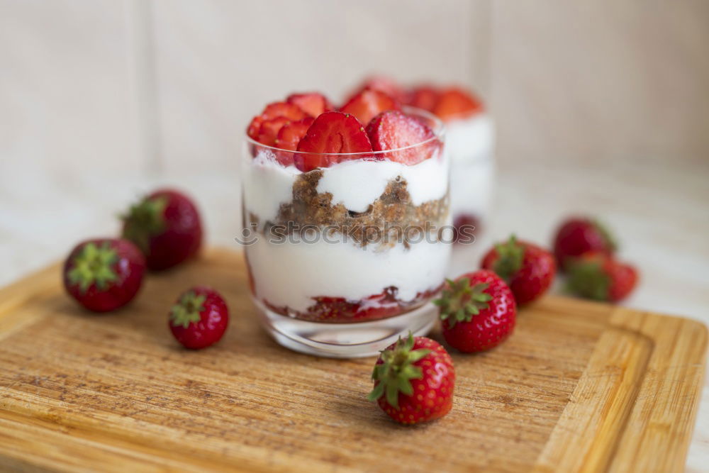 Similar – Yogurt with cereals and strawberries