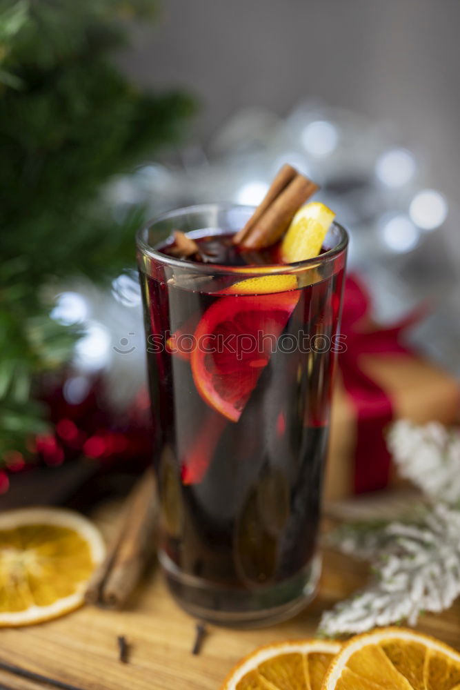 Similar – Image, Stock Photo Mulled wine glass with orange, cinnamon and star anise