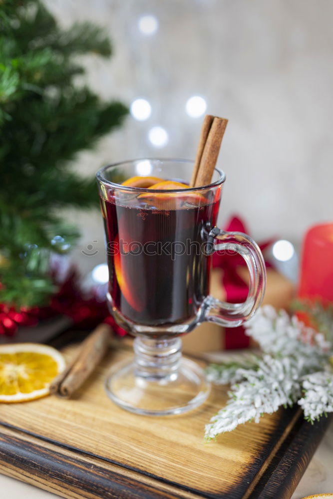 Similar – Image, Stock Photo Mulled wine glass with orange, cinnamon and star anise
