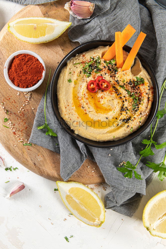 Similar – Image, Stock Photo Mediterranean goat cheese baked in parchment paper