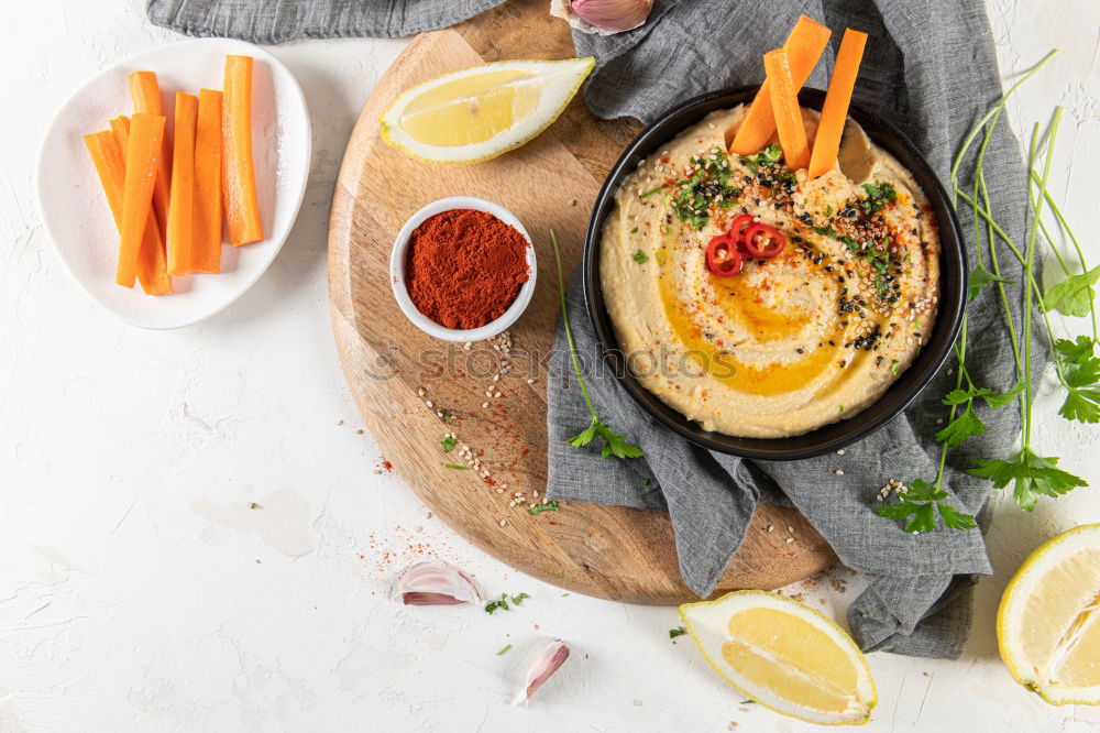Similar – Image, Stock Photo Carrots with thyme, garlic, lemon and honey on a baking tray