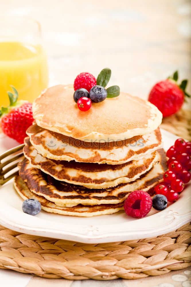 Similar – Pancakes with raspberries and blueberries