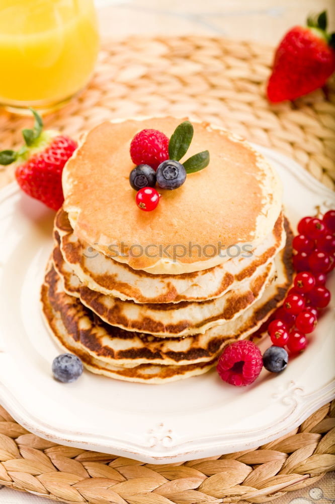 Similar – Pancakes with raspberries and blueberries