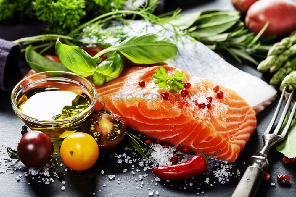 Similar – Salmon fillet with ingredients on a rustic wooden table