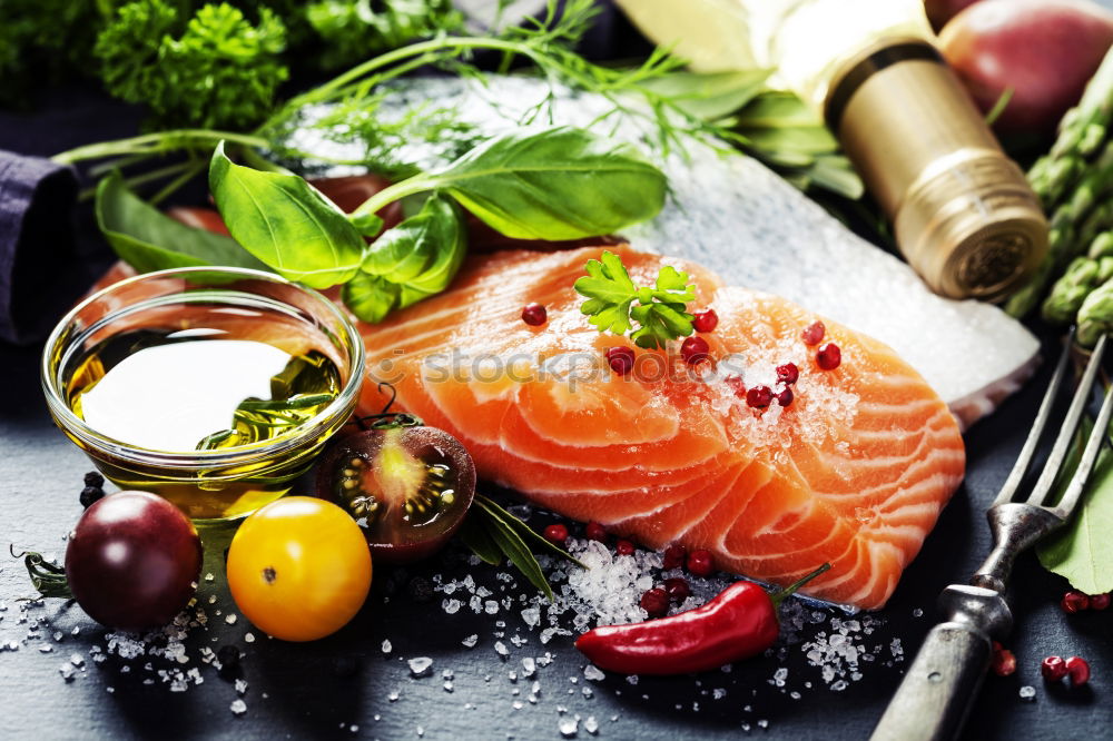 Similar – Image, Stock Photo Laschsfilet with fork and fresh ingredients for cooking