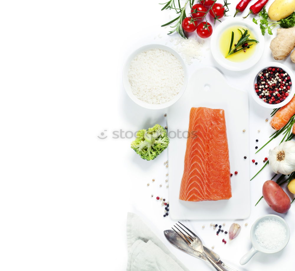 Similar – Salmon with spinach on a white kitchen table