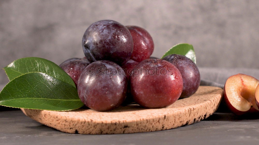 Similar – Image, Stock Photo Fresh plums with leaves