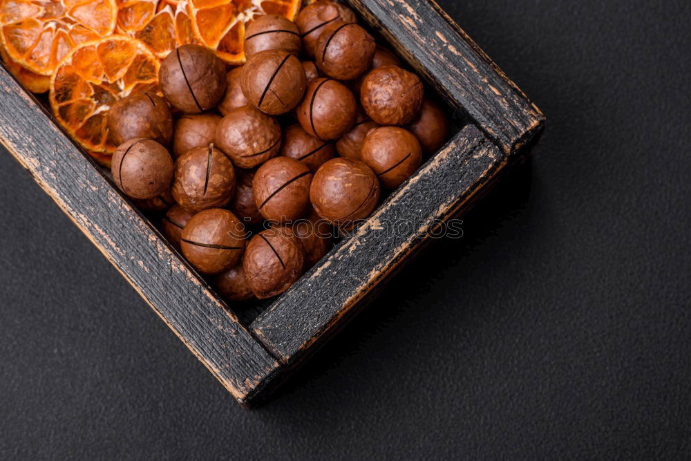 Similar – Image, Stock Photo Kumquat fruits on a dark wooden background