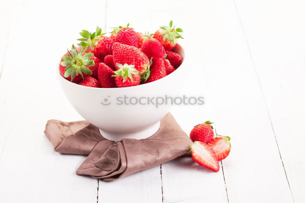 Similar – Strawberries in a bowl on a white wooden table