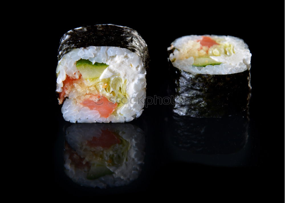 Similar – Chopstick with a sushi on black stone