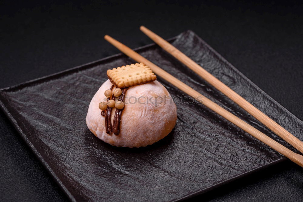 Similar – sushi assortment and soya sauce on black background