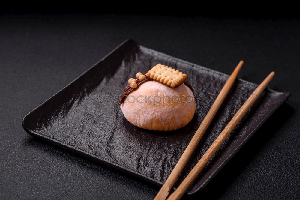 Similar – sushi assortment and soya sauce on black background