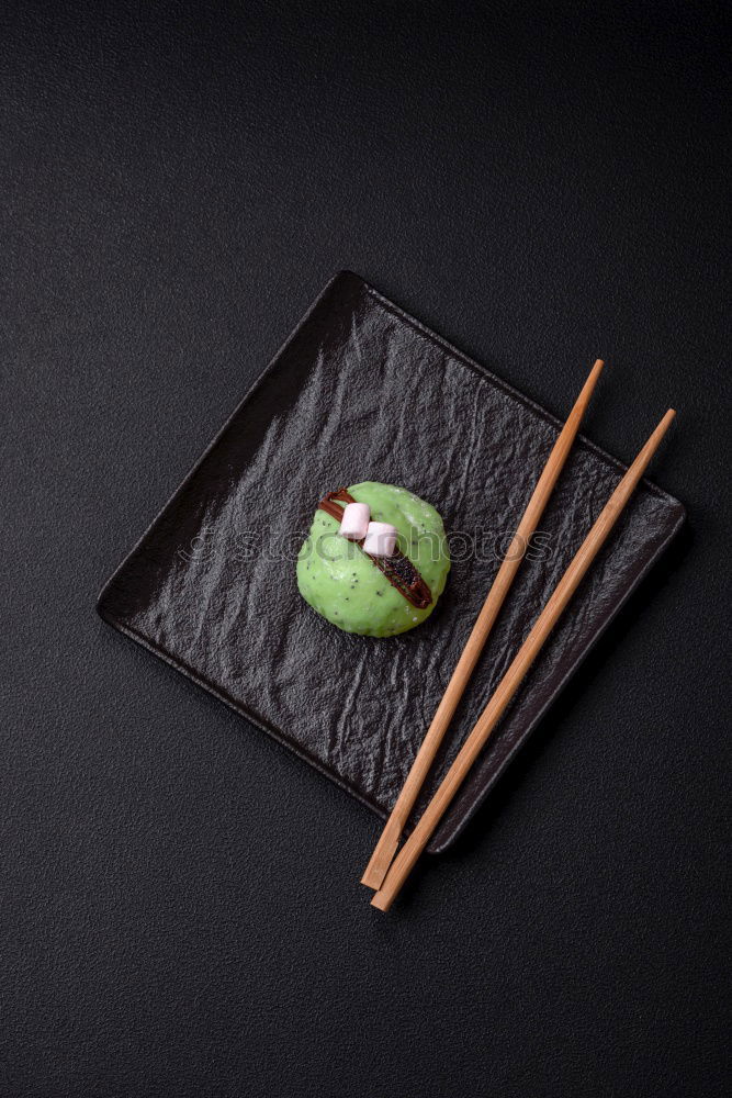 Similar – sushi assortment and soya sauce on black background