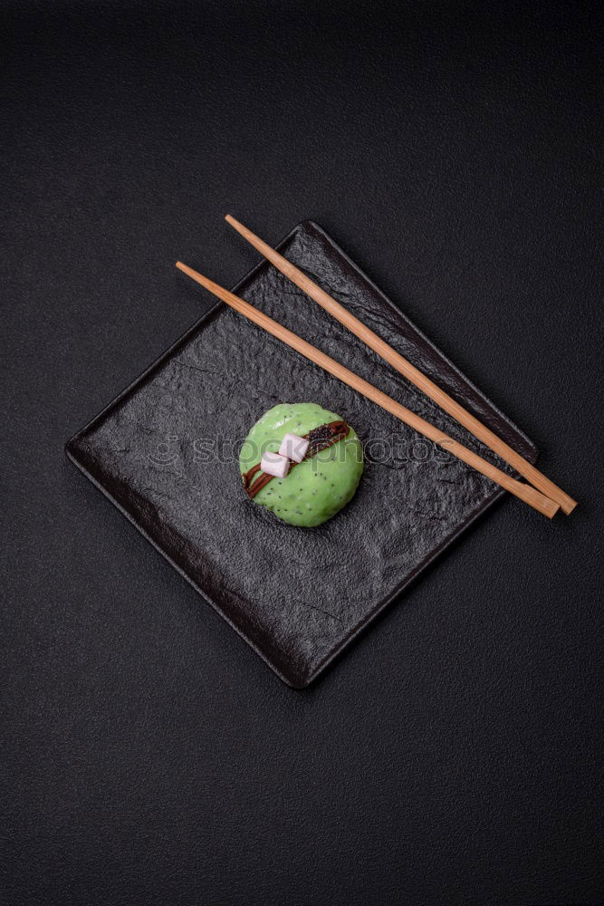 Similar – sushi assortment and soya sauce on black background