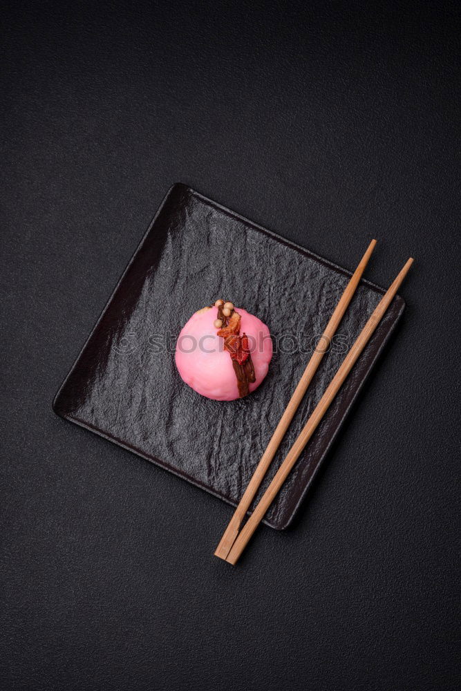 Similar – sushi assortment and soya sauce on black background