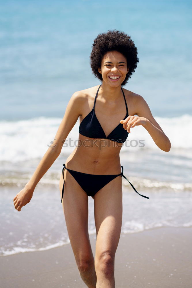 Similar – Image, Stock Photo Beautiful young woman wearing a bikini in a wooden foot bridge at the beach