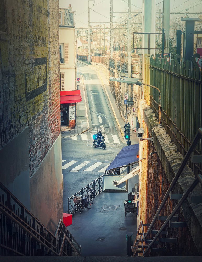 Similar – The narrow streets with tall buildings