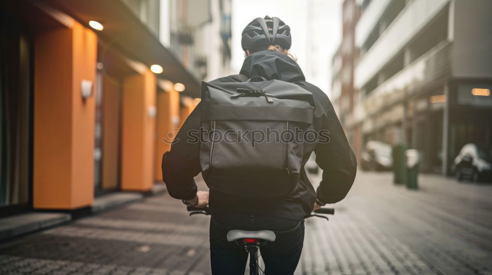 Similar – Portrait of young skateboarder man with bad boy face in the middle of the street.