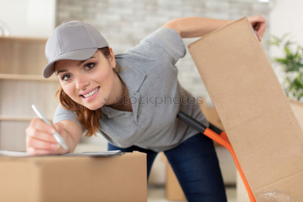 Man carrying moving boxes