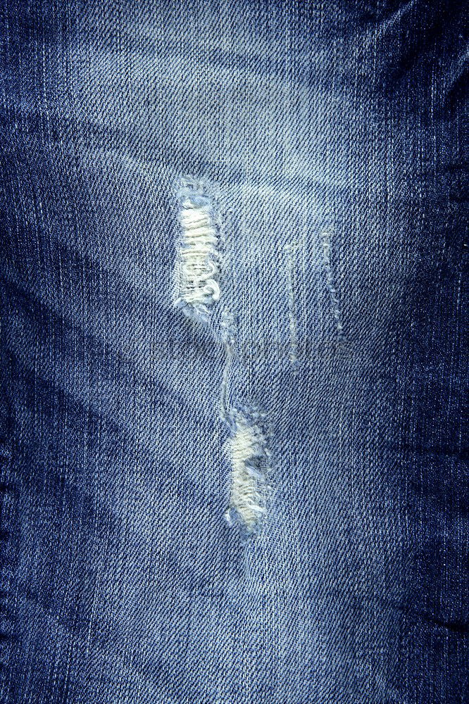 Similar – zerrissene Jeans kaputt