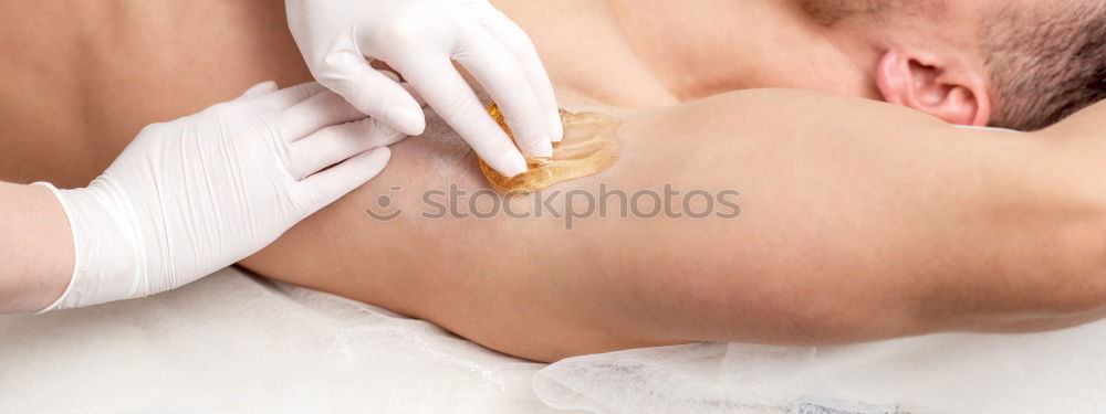 Similar – Image, Stock Photo young man at the physio therapy with pain