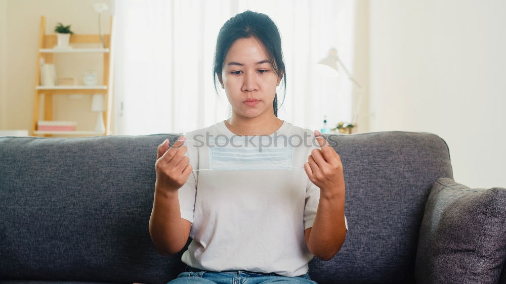 Similar – Image, Stock Photo Portrait of a young thoughtful mixed race man sitting in the sofa