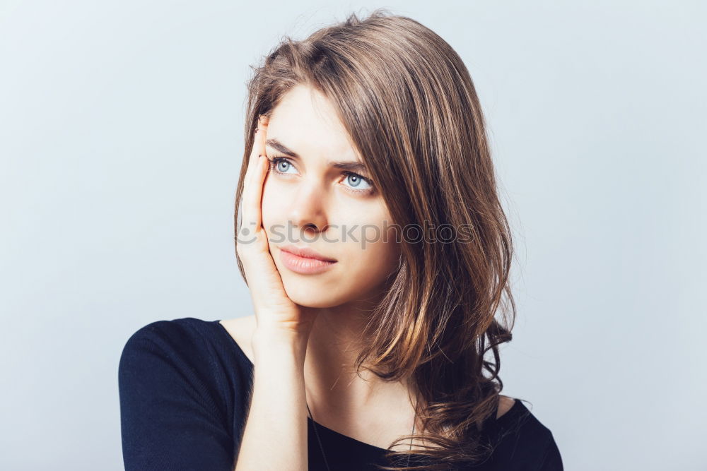 Similar – Close up portrait of a beautiful young woman