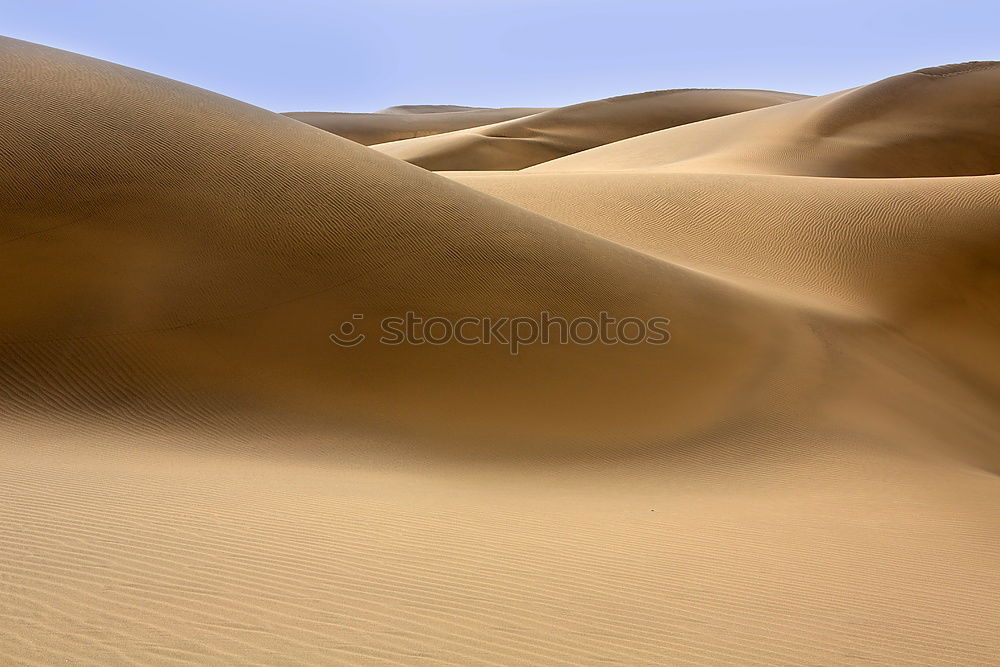 Similar – Sand as far as the eye can see