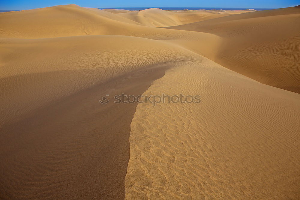 Similar – Sand as far as the eye can see