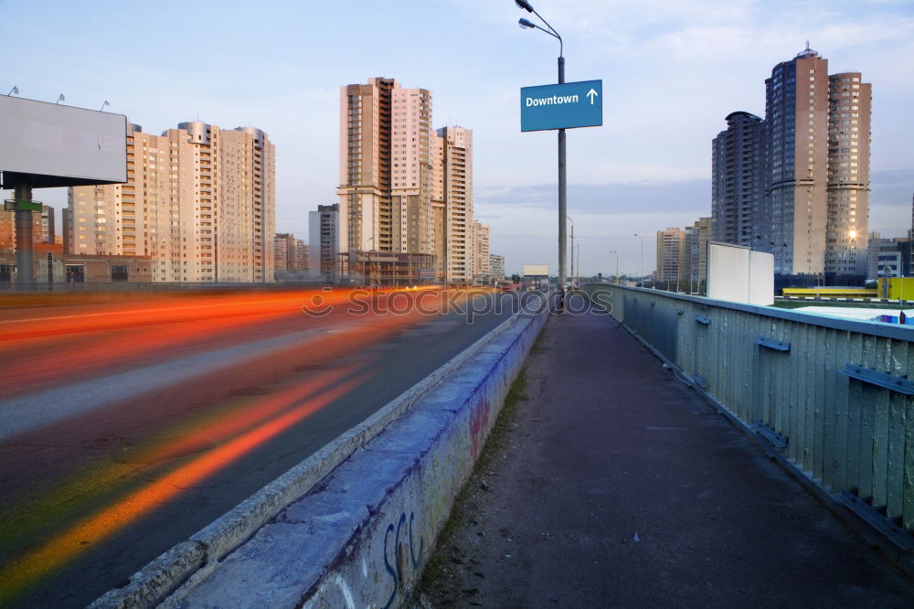 Similar – Cityscape of traffic road at sunset