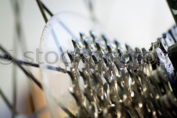 Similar – man’s hands goldsmith work on a piece of silver