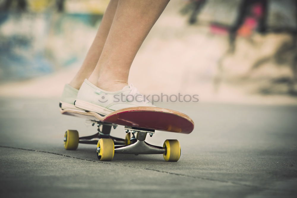 Similar – Person rides the skateboard