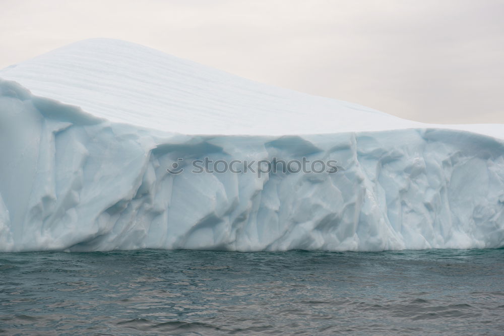 Similar – Wall of glacier in sea