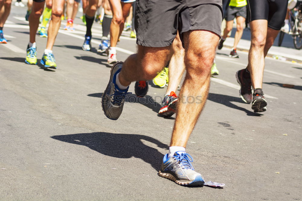 Similar – Sportsman looking a smartwatch