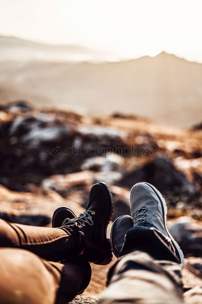 Image, Stock Photo Legs of man sitting at cliff