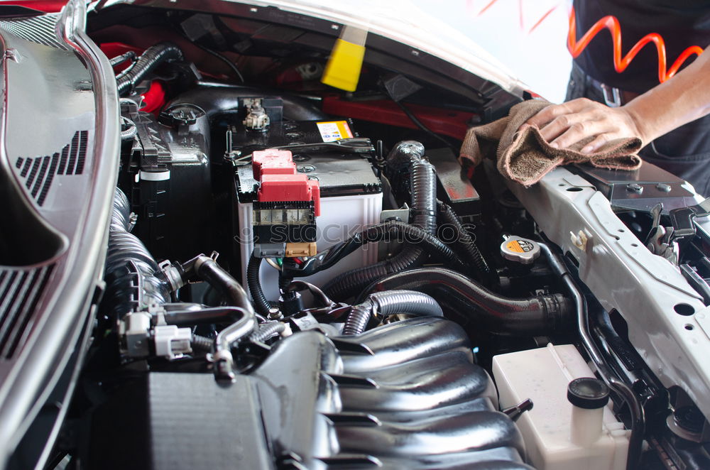 Similar – Image, Stock Photo Mechanic repairing customized motorcycle