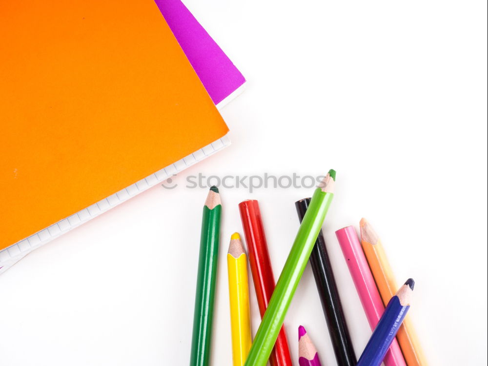 Similar – Notepads, papers, markers and other stationery on wooden table