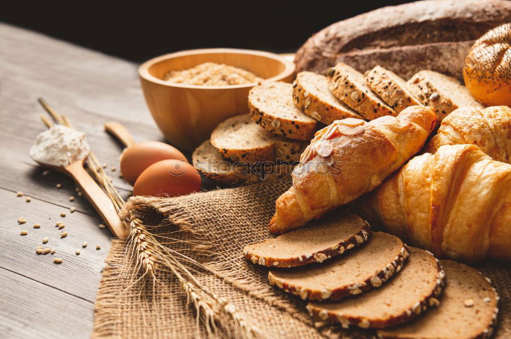 fresh bread and baked goods on wooden